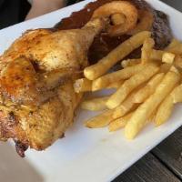 Chicken And Ribs · Half rack of ribs, half of rotisserie chicken and garlic mashed potatoes