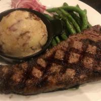 New York Steak · Upper 2/3 Choice 12 ounce New York Steak 

served with homemade mash potatoes and asparagus.