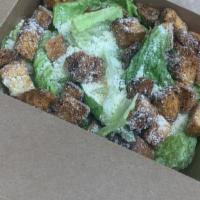 Caesar · Romaine, Parmesan, croutons, and Caesar dressing. Add chicken for an additional charge.