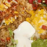 1 Taco & Cheese Enchilada Dinner · Served with rice and beans.