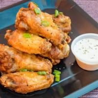Lemon Pepper · 8 traditional wings tossed in lemon pepper (mild heat), served with carrots & celery and a d...