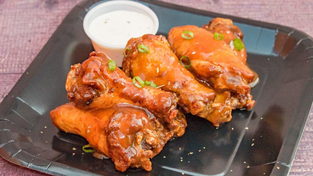 Sweet Chili · 8 traditional wings tossed in sweet chili (mild heat), served with a dipping sauce of your choice.