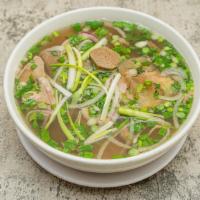 C-11. House Special - Phở Đặc Biệt · House special (rare eye-round steak, flank, brisket, beef ball, tendon, tripe, tripe with ri...