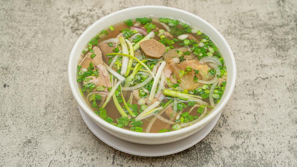 C-11. House Special - Phở Đặc Biệt · House special (rare eye-round steak, flank, brisket, beef ball, tendon, tripe, tripe with rice noodle soup).