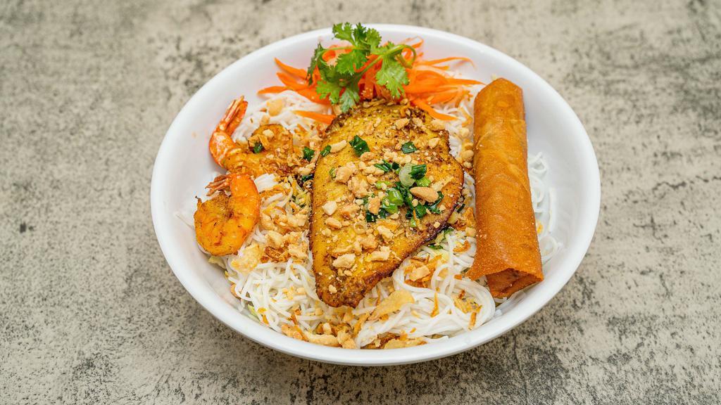 F-73. Grilled Shrimp, Grilled Chicken And Fried Egg Roll With Steam Rice - Cơm Tôm Gà Nướng Chả Giò · Grilled shrimp, grilled chicken and fried egg roll with steam rice.