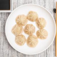 Pork Xiao Long Bao 小笼包 · The delicate steamed dumpling filled with pork and soup. 8 pieces.