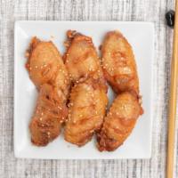 Grilled Wings 小熊烤翅 · New Orleans flavor roasted chicken wings.