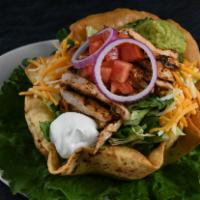 Taco Salad Chicken · Sour cream, avocado, Cheddar and Monterrey Jack cheese, black olives, corn, tomatoes, tortil...