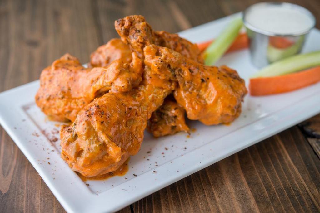 Chicken Wings · Hearb seasoned party wings, deep fried, glazed with spicy, mild, bbq, lemong pepper or no sauce