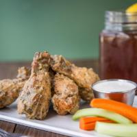 Crispy Wings (Breaded) · Herb seasoned party wings, coated with signature cornmeal crust, served traditionally, or to...