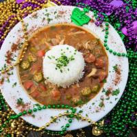 Gumbo · Traditional savory roux broth, cooked with shrimp, chicken, and andouille sausage. Served wi...