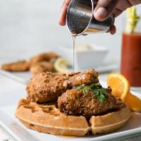 Chicken & Waffle · Signature fried chicken, belgian waffle, maple syrup, creaming honey butter
