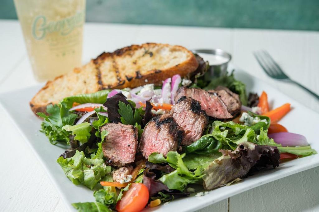 Tri-Tip Salad · Grilled to order Black Angus tri-tip, blue cheese, spring mix, red onions, tomatoes, red peppers, mandarin oranges