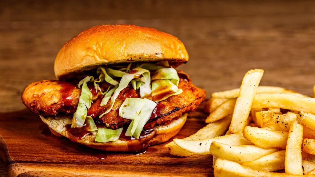 Katsu Sandwich · Crispy chicken katsu served on a toasted bun topped with cabbage and katsu BBQ served with a side of fries.