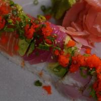 Rainbow Roll · inside: spicy tuna, imitation crab, cucumber - top: tuna, yellowtail, salmon, shrimp & avoca...