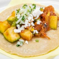 Taco - Calabacitas · Mexican Squash and Roasted Corn. Tomatillo Salsa, Onion, Cilantro, and Queso Fresco.
