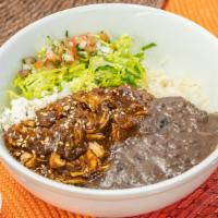 Bowl - Pollo En Mole Poblano · Chicken in Mole Poblano Sauce. White Rice, Refried Black Beans, Sesame Seeds, Onion, and Que...