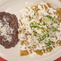 Chilaquiles Verdes · The classic Mexican breakfast cure-all. Crisp tortilla chips, sautéed in our home-made Green...