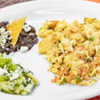 Huevos A La Mexicana · Eggs, scrambled with fresh Tomato, Onion, and Chile Serrano. Served with Salsa Verde cruda, ...