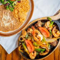 Mixed Fajitas · Includes rice, beans, salad, and tortillas. What kind of tortillas would you like (corn or f...