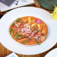 Panang Beef · Authentic Thai crimson-hued dish, combines bright lemongrass and sweet coconut milk to infus...