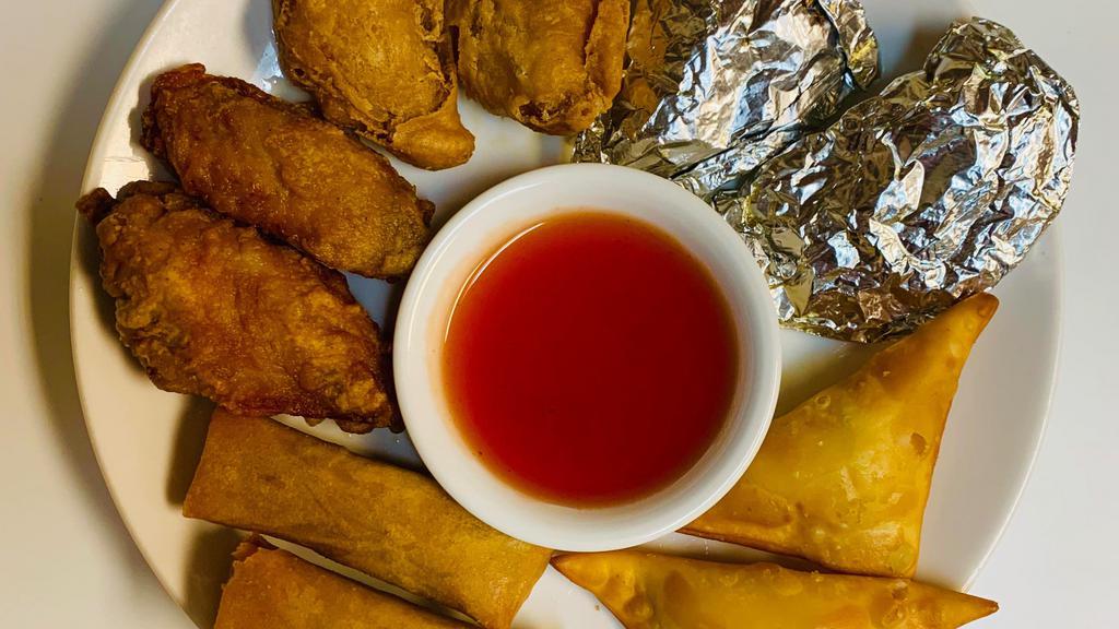 Po Po Platter · Two spring rolls, two foil-wrapped chicken, , two crab meat cheese wontons, two fried prawns , Deep Fried Pot Stickers  .