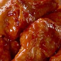 Traditional Wings · An order of our classic, crispy bone-in wings covered in your choice of sauce.