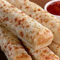 Cheese Sticks · 5 breadsticks topped with melted cheese and sprinkled with Italian seasoning. Served with ma...