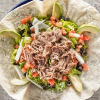 Taco Salad · Chicken, beef or carnitas on a bed of tossed greens, with a honey-dijon vinaigrette dressing...