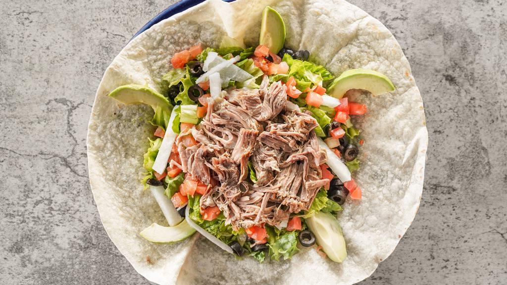 Taco Salad · Chicken, beef or carnitas on a bed of tossed greens, with a honey-dijon vinaigrette dressing served with jicama, tomatoes, olives and avocado slices.