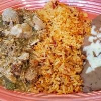 Chili Verde · Delicate pieces of pork cooked slowly in a tomatillo and chili sauce; served with rice, bean...