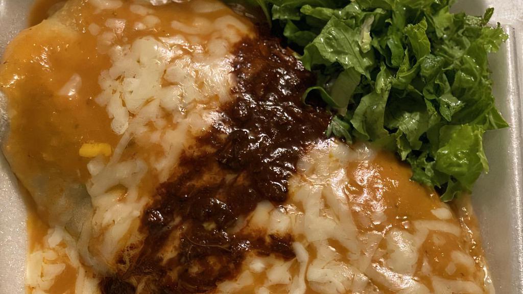 El Grande Burrito · Rice, tomatoes, onions, black beans, red & green peppers in a giant flour tortilla smothered with vientos burrito sauce topped with cheese and served with a salad. Our rice and sauce are made with chicken broth.