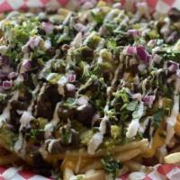 Diablo Fries · French fries, choice of meat, nacho cheese, sour cream and guacamole.