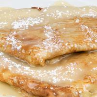 Honey Lemon Crepes · Two crepes topped with our special blend of lemon butter and honey. Topped with powder sugar.