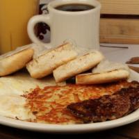 Country Biscuits & Gravy · Two biscuits with pork sausage gravy, hash browns, two eggs & four pork sausages.