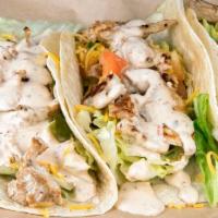Chipotle Chicken Mini Wraps · Grilled chicken breast covered with shredded cheddar, lettuce, diced tomatoes & our special ...