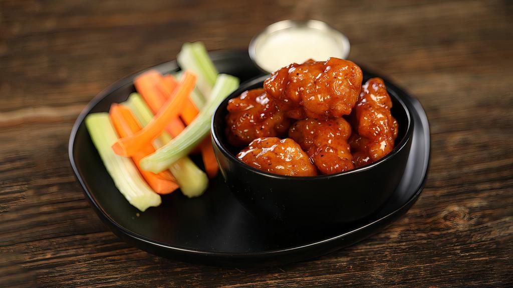 Hot Honey - 8 Wings · 8 boneless wings tossed in hot honey (medium heat), served with carrots & celery and a dipping sauce of your choice.