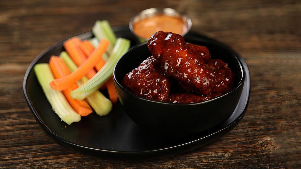Teriyaki - 8 Wings · 8 boneless wings tossed in teriyaki (mild heat), served with carrots & celery and a dipping sauce of your choice.
