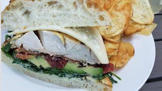 Free Range Chicken Club · Served with house potato chips. All natural protein.  Free range. Artisan roll, arugula, slo...
