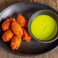 Black Eyed Pea Fritters With Spicy Herb Sauce · 