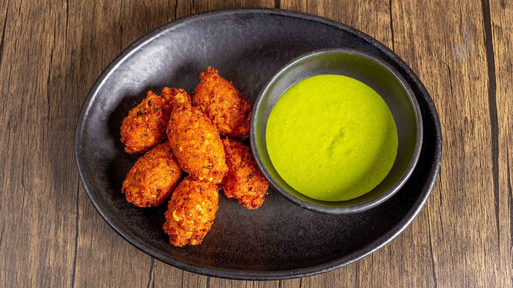 Black Eyed Pea Fritters With Spicy Herb Sauce · 