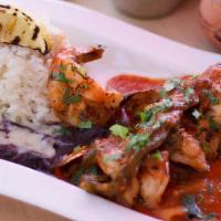 Spicy Mexican Shrimp · served with spicy costa brava sauce, white rice, black beans and tortillas.