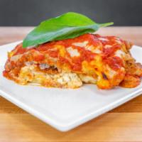 Lasagna · Traditional lasagna with ground beef, herbs and lots of cheese!