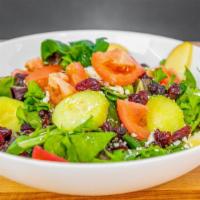 Health Nut Salad · Spring mix with pecans, feta cheese, apples, dried cranberries, cucumbers and tomatoes with ...