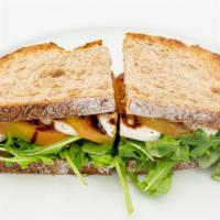 Caprese Sandwich · Fresh mozzarella, organic arugula, vine tomato, balsamic truffle, chili & pepper. Add smoked...