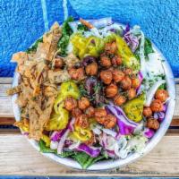 Greek Side Salad · Romaine, onion, green pepper, tomato, cucumber, feta, cabbage, pepperoncini, olives, lavash ...