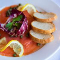 Salmone Affumicato · Smoked Scottish salmon with capers, lemon and virgin olive oil.