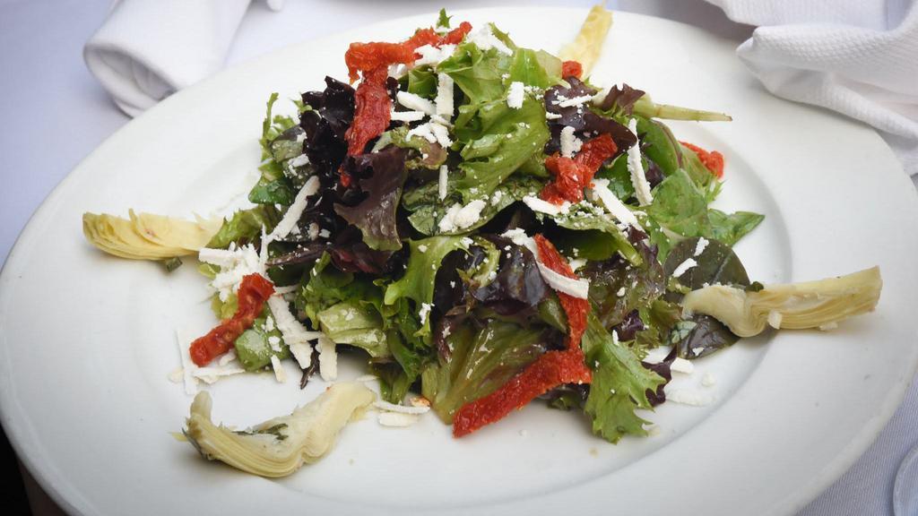 House Salad · For two. Baby mix with artichoke hearts, sun-dried tomatoes and slivers of Pecorino cheese with balsamic vinaigrette.