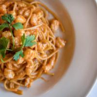 Spaghetti Della Casa · Vito's favorite. Chopped shrimp sautéed with shallots and flamed with cognac and a touch of ...