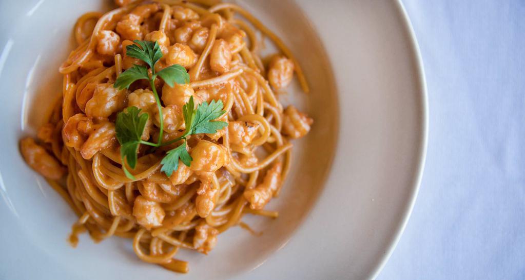 Spaghetti Della Casa · Vito's favorite. Chopped shrimp sautéed with shallots and flamed with cognac and a touch of cream and tomato sauce. This is positively scrumptious. A hit!